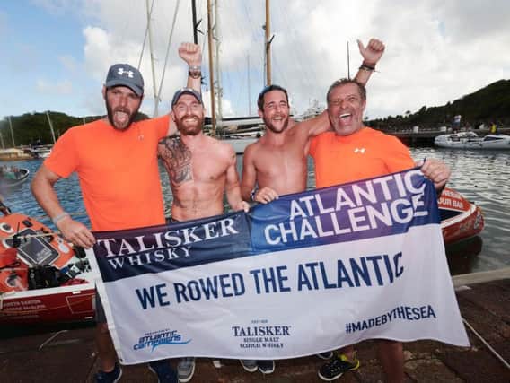 Handout photo issued by the Talisker Whisky Atlantic Challenge of (left-right) George McAlpin, Gareth Barton, Alistair Cooper and Luke Bakercelebrate as they become the fastest Northern Irishmen in history to row across the Atlantic during the Talisker Whisky Atlantic Challenge, dubbed the world's toughest row, during the 3,000-mile crossing from La Gomera in the Canary Islands to Antigua in the Caribbean