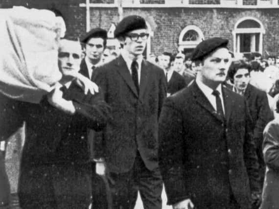 Undated picture of Gerry Adams (centre) in Belfast acting as a member of the IRA guard of honour, as the Sinn Fein leader has launched a legal bid to overturn two historical convictions for attempting to escape from prison.