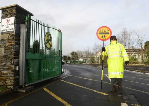 A lollipop lady at Orangefield Primary School in east Belfast that was open on Wednesday