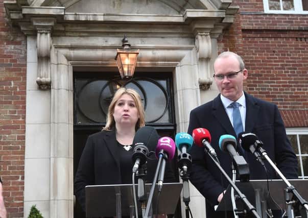 Northern Ireland Secretary Karen Bradley and Irish foreign affairs minister Simon Coveney speaking to the media at Stormont in Belfast where they announced fresh round of political talks