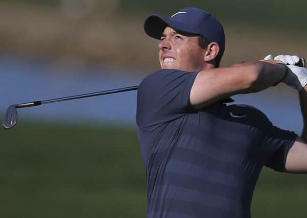 Rory McIlroy plays a shot on the 16th hole during the second round