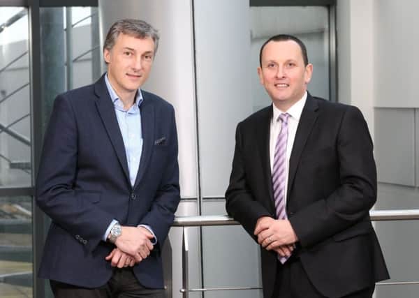 SureCert founder Ian Savage, right,  with Brian Cummings from Clarendon/Co-FundNI