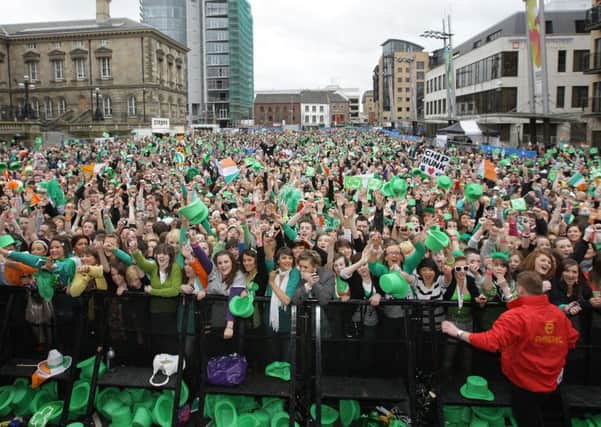Crowds in Custom House Square, Belfast for a St Patrick's Day free concert