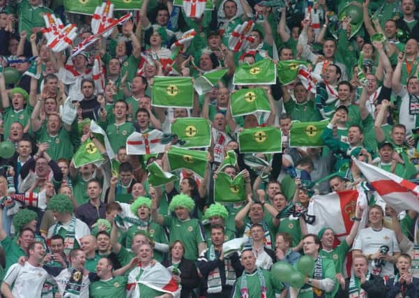 Northern Ireland fans in full voice during the 2005 World Cup qualifier against England at Old Trafford..