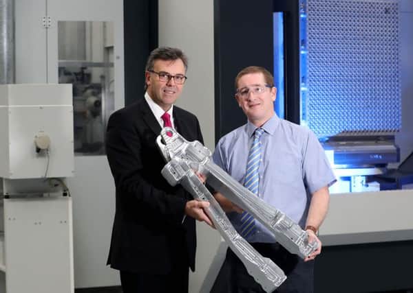 Invest NI chief executive Alastair Hamilton pictured, right, with Moyola Precision Engineering MD Mark Semple