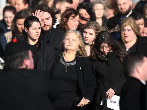 Eileen O'Riordan (centre) following the funeral of her daughter and The Cranberries singer Dolores O'Riordan at Saint Ailbe's Church, Ballybricken.