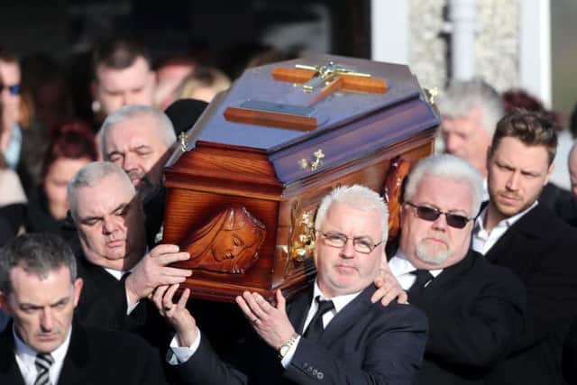 Mourners carry the coffin carrying The Cranberries singer Dolores O'Riordan