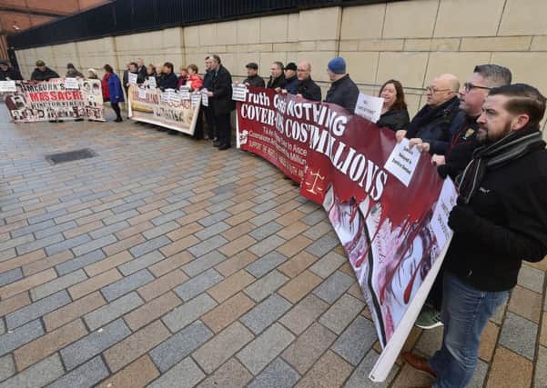 Families and supporters of the Loughanisland massacre, including Sinn Fein politicians, at Belfast High Court on Friday for the judgment in which Mr Justice McCloskey decided he will step aside after a claim of a perception of bias.
 Photo Arthur Allison/Pacemaker Press