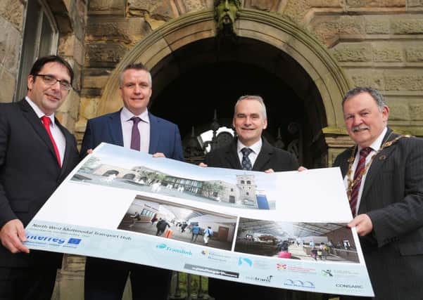 The Mayor of Derry and Strabane District Council, Cllr Maoliosa McHugh with Tom Reid, Director, Transport Strategy, DFI, Gary McCluskey, project manager, Translink and Chris Conway, Group Chief Executive, Translink.