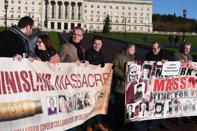 Family  and supporters, including Sinn Fein politicians, of the Loughinisland and other massacres at Stormont in November. 

Pic Colm Lenaghan/Pacemaker