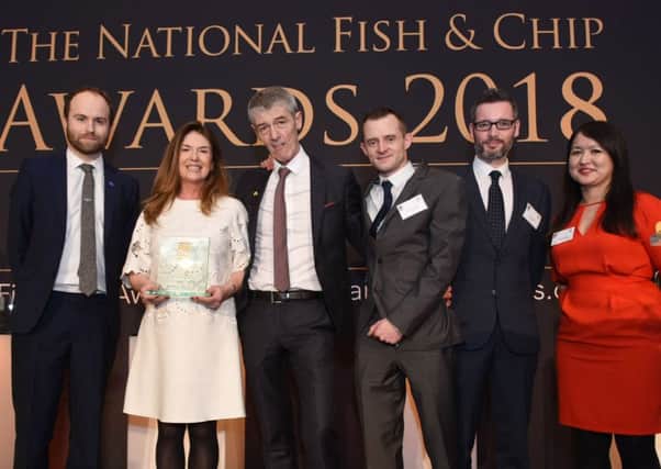 Fish City owners Grainne and John Lavery, second and third left, won twice at the Seafish National Fish and Chip Awards in London