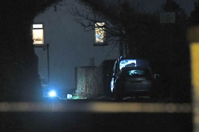 Police at the Scene  on Mill Road  after A man in his 60s has been found dead in Crumlin, County Antrim.
Police said they are treating his death as suspicious.
 Photo Pacemaker Press
