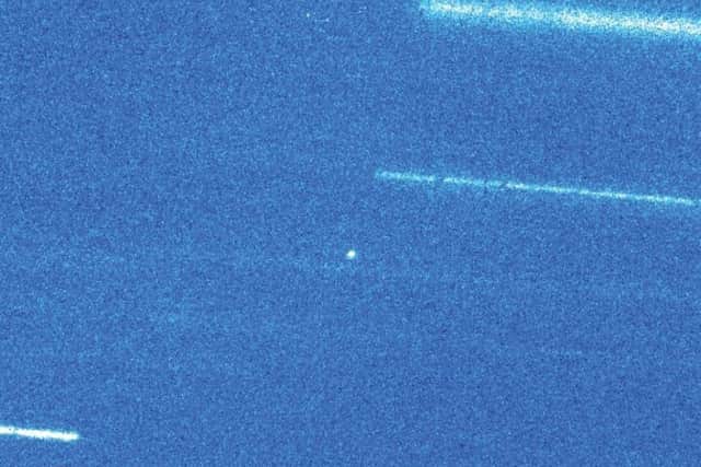 The tiny dot represents the mysterious Oumuamua