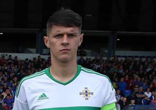 Derry City's talented defender, Eoin Toal pictured captaining Northern Ireland U19s during last summer's SuperCupNI Challenge Cup match against Man United.
