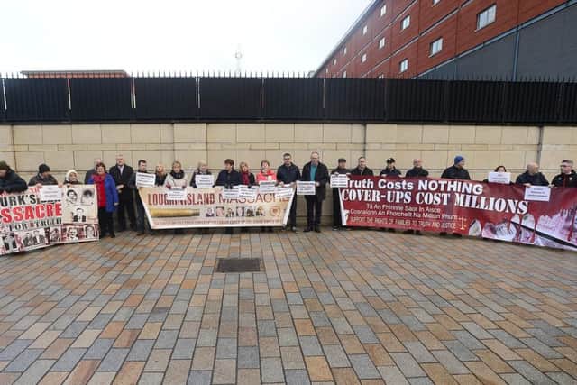 Families and supporters of the Loughanisland massacre at Belfast High Court on Friday. Do they support justice for all including police officers?

Photo Arthur Allison/Pacemaker Press