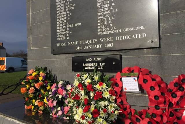 The names of Thomas Saunders and Gordon Wright were added to the memorial.