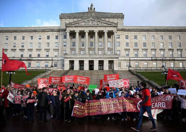 Irish language act campaigners, including pupils from Irish-medium schools across Northern Ireland, take part in a protest at Stormont parliament buildings in Belfast, ahead of a meeting with Northern Ireland Secretary Karen Bradley on Thursday. Photo: Brian Lawless/PA Wire