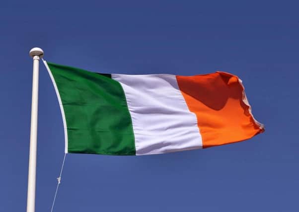 Sinn Fein is calling for the St Patrick's parade in Strabane to be exempted from council policy of no political emblems.