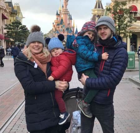 The Thompson family at Disneyland in January.