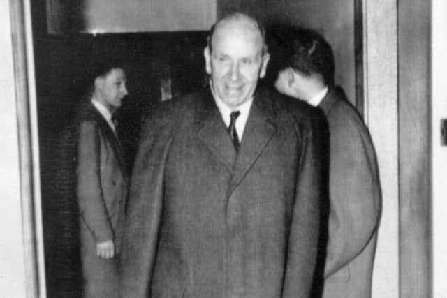 Manchester United manager Matt Busby on his way to the directors' box at Old Trafford, where his team were playing a First Division game against Newcastle. It was the first team he had attended a match at Old Trafford since the Munich air disaster, in which he was severely injured.