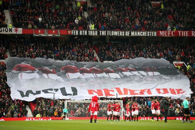 A banner remembering the victims of the Munich air disaster during a match at Old Trafford in February last year