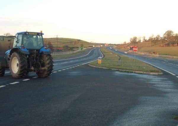 It is dangerous for agricultural and other slow moving vehicles, above, to cross the many dangerous gap junctions in the A1 dual carriageway