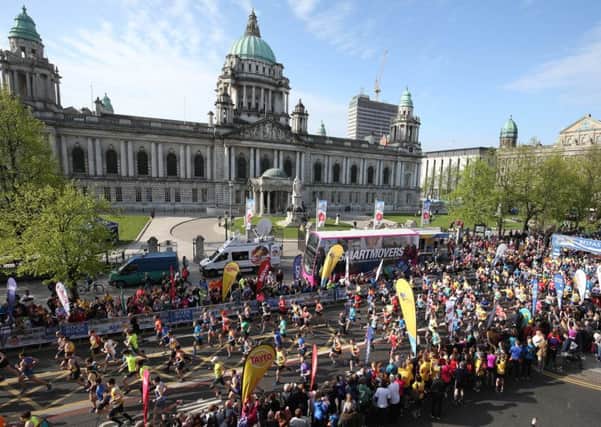 Runners in the Belfast City Marathon pass City Hall in 2017. Picture by Matt Mackey / Press Eye.