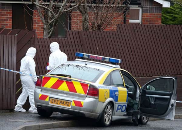 Police and forensic experts pictured at the scene on Creeslough Court in the Lenadoon area of west Belfast where a small explosion took place on Wednesday evening. 

Picture by Jonathan Porter/PressEye