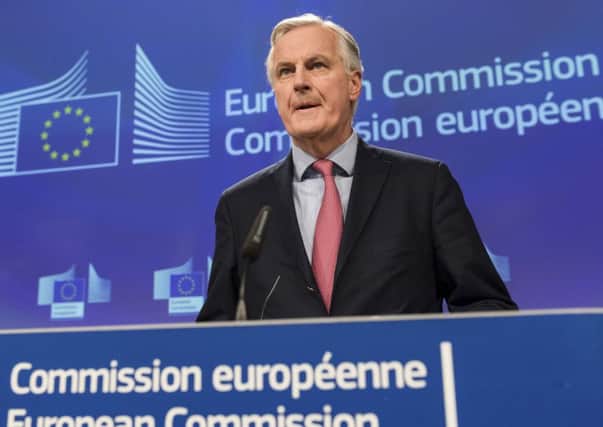 European Union chief Brexit negotiator Michel Barnier addresses the media on Brexit at EU headquarters in Brussels on Friday