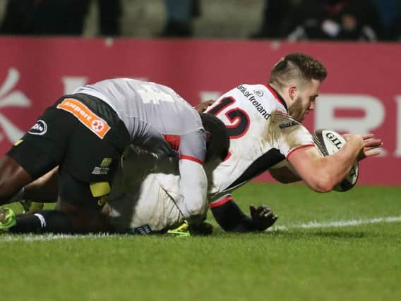 Stuart McCloskey goes over for a try for Ulster
