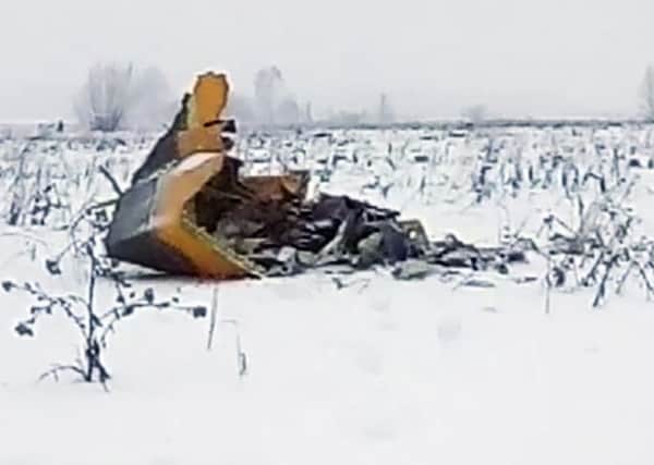 In this screen grab provided by the Life.ru, the wreckage of a AN-148 plane is seen in Stepanovskoye village, about 40 kilometers (25 miles) from the Domodedovo airport, Russia