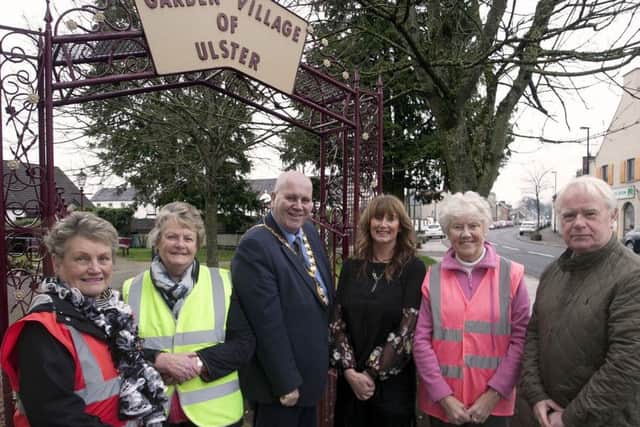 The Broughshane Community Association including chairman Lexie Scott (right)