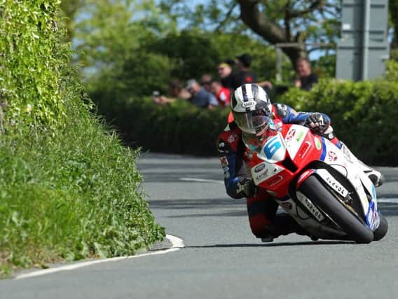 Michael Dunlop won both Supersport races at the Isle of Man TT in 2013 after linking up with PTR and Hunts Motorcycles to ride a Honda.