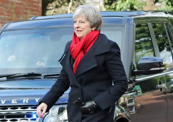 Prime Minister Theresa May arrives at Stormont House in Belfast ahead of talks aimed at ending the 13-month political stalemate in Northern Ireland.
