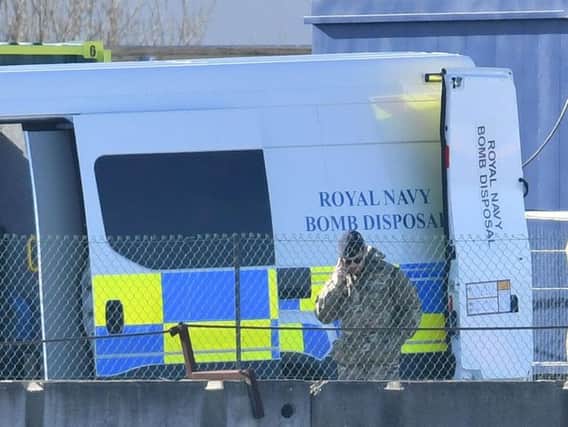 A Royal Navy bomb disposal unit at London City Airport which has been closed after the discovery of an unexploded Second World War bomb