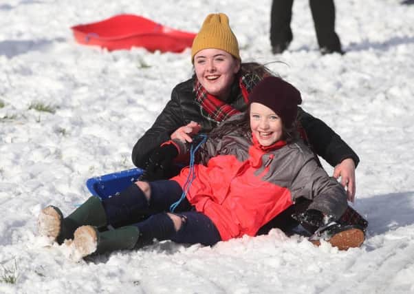 Â©Lorcan Doherty February 12th 2018


Sisters Isabel (10) and Josephine (14) Nelis, from Creggan, enjoying the Mid Term Break snow fall in Brooke Park.