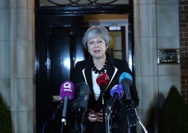 Prime Minister Theresa May speaks to the media outside Stormont House on Monday, as the British and Irish prime ministers held meetings with the Northern Ireland parties.
Picture: Colm Lenaghan/Pacemaker