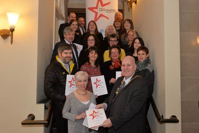 Valerie Martin, Group Editor, Johnston Press NI and Councillor, Paul Reid, Mayor of Mid and East Antrim Borough Council are  pictured with guests at the official launch of the Larne Times 2018 Larne Business Awards in Larne Town Hall. INLT -6-009-PSB