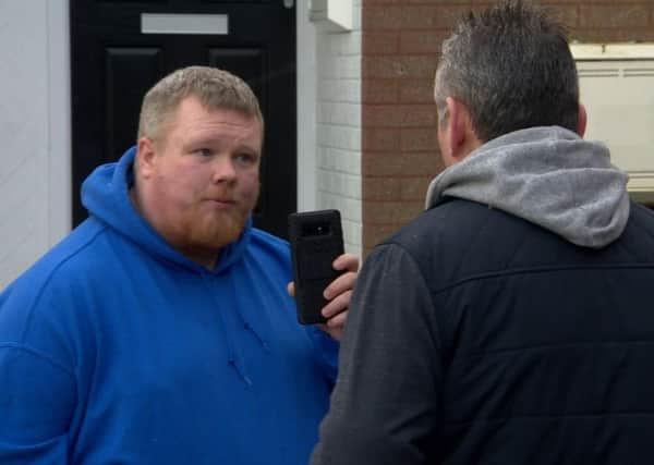 BBC reporter Kevin Magee (right) attempts to interview self-styled paedophile hunter George Keenan. Pic: BBC News NI