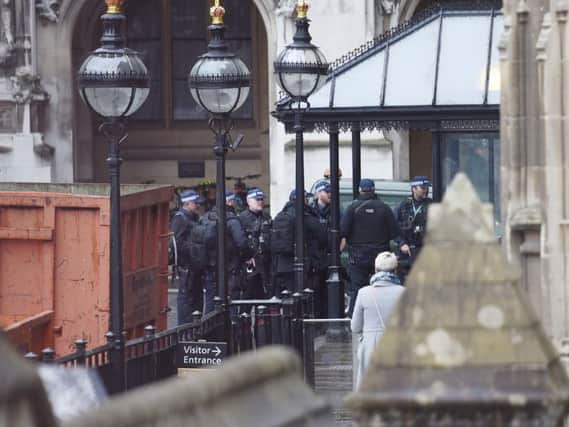 Armed officers deployed inside the Palace of Westminster where police say that they are "investigating an incident" in the Houses of Parliament.