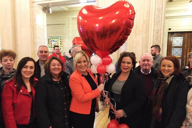 Sinn Fein's Michelle O'Neill (centre left) and Mary Lou McDonald (centre right) with party colleagues at Stormont Parliament Buildings during a same sex marriage event, where campaigners delivered Valentines Day cards, as talks to restore powersharing continue