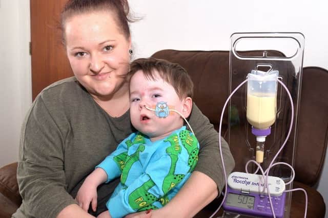 Little Anthony Black who is fed through a tube and mum, Alicja. INPT07-209.