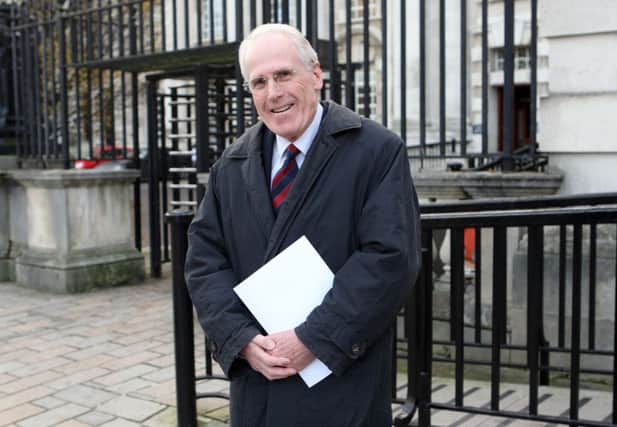 Former minister of the environment Dermot Nesbitt leaving Belfast High Court