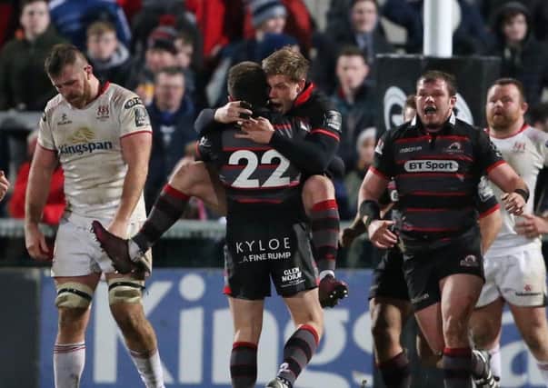 Edinburgh's Duncan Weir (22) is mobbed after kicking a drop goal to win against Ulster during Friday night's Guinness PRO 14 match at Kingspan Stadium. Picture by Brian Little