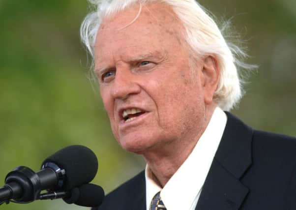 The Rev. Billy Graham speaks on stage in the Queens borough of New York in 2005.  (AP Photo/Henny Ray Abrams)