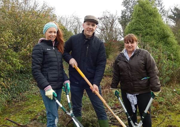 Volunteers Janine Kennedy from Whiteabbey and Joanne Crompton from Drumalis (left and right) with Jonny Hanson at the first community volunteer day