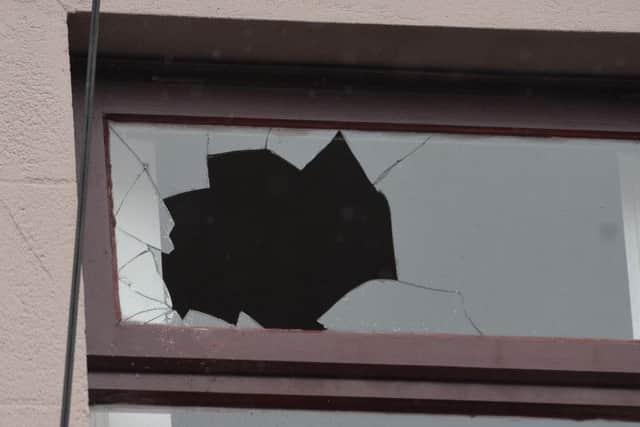 An upstairs window was smashed during the early morning attack. Pic by Colm Lenaghan, Pacemaker Press