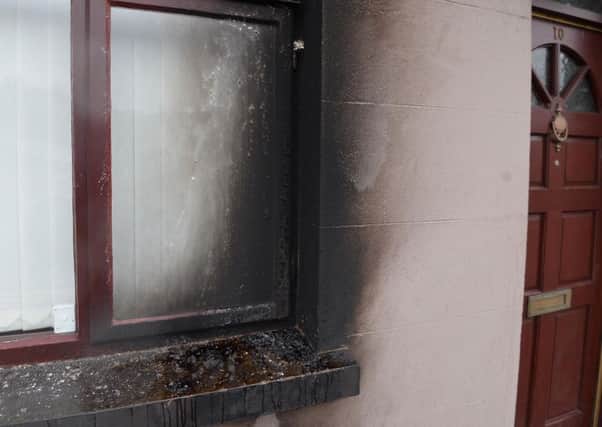 The petrol bomb caused damage to the outside of the house