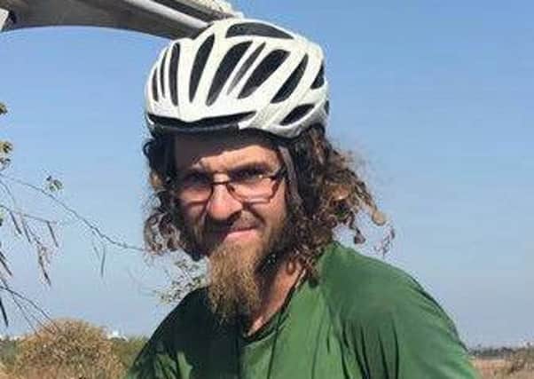 Oliver McAfee from Dromore in Co Down has gone missing while on a cycling trip around Israel