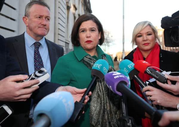Sinn Fein's Conor Murphy, Mary Lou McDonald and Michelle O'Neill arrive at Government Buildings in Dublin for a meeting with Taoiseach Leo Varadkar on Monday, February 19.